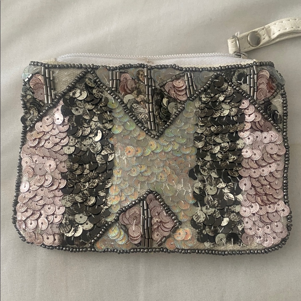 Silver sequin white colored wristlet